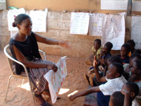 Teacher with class, Zambia