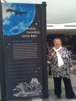 Morag at teh entrance to her exhibition