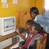 African students using a desktop computer