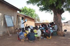 outdoor classroom under a tree Ghana