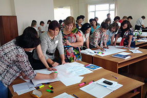 Educators work in groups