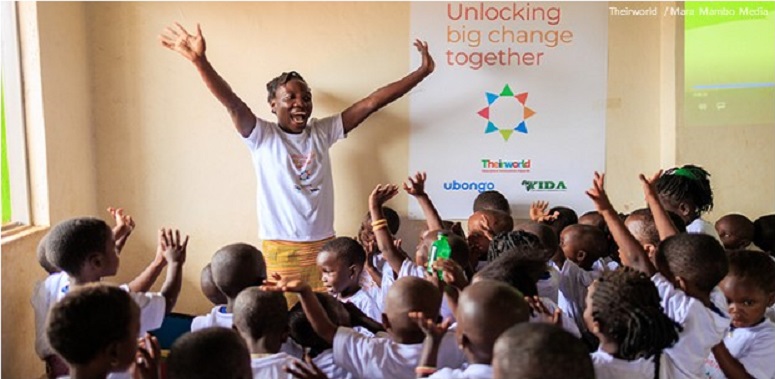 Volunteer teacher leads community activity with refugee children