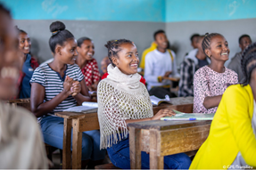 Secondary school students laugh in classroom in Ethiopia