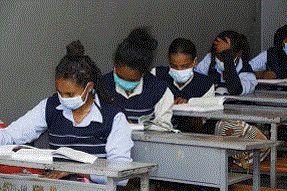 Children study in class with masks on during Covid times, Ethiopia