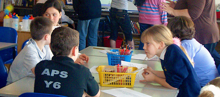 Children with adult in class