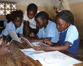 School students and laptops Zambia