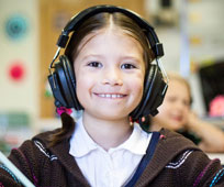 Child with headphones.