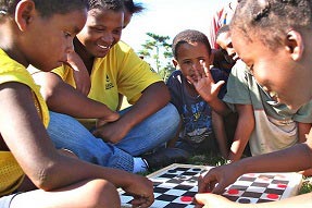 Children playing a board game, South Africa