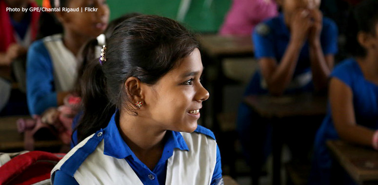 A smiling student in class at Azimpur Government Primary School. Dhaka, Bangladesh