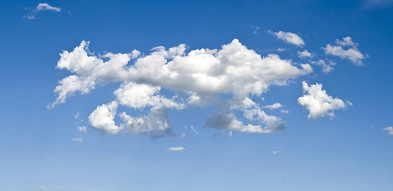 Fluffy clouds in a blue sky